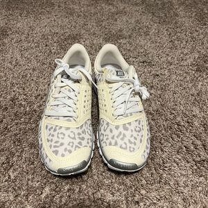 NWOB Snow Leopard Rhinestoned Nikes womens size 8.5.